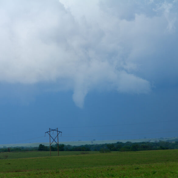 Small funnel that later turned into a very brief tornado