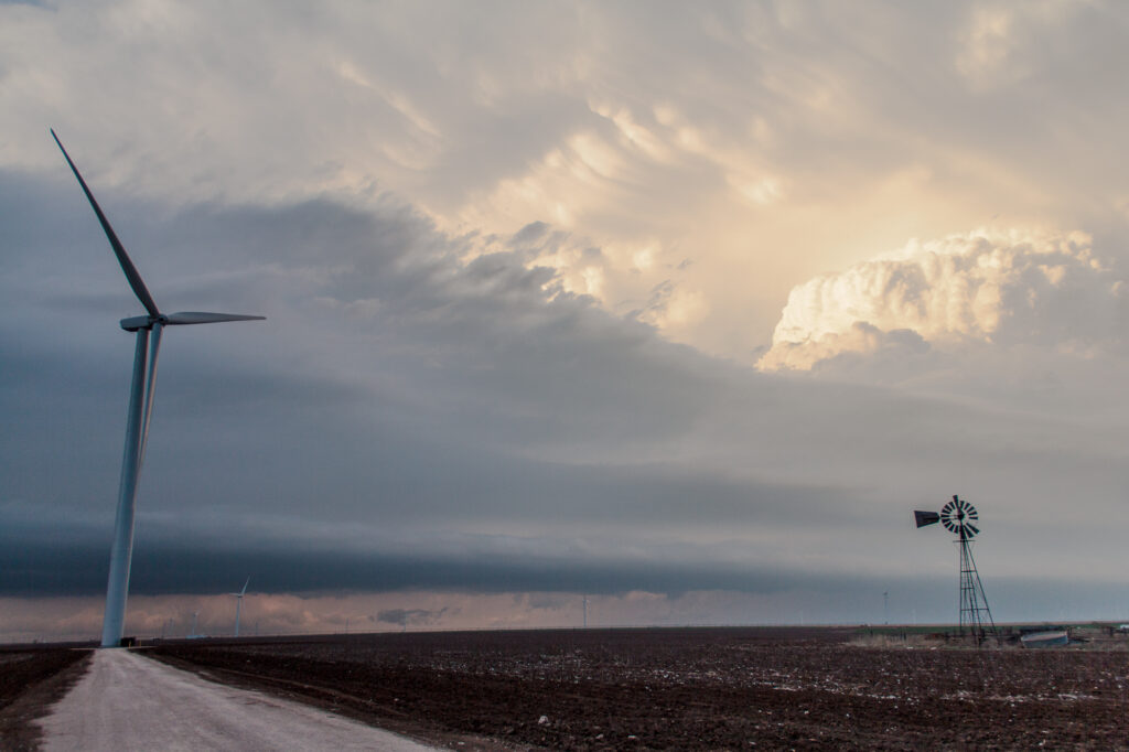 Old and new windmills in front of a supercell in the Texas Panhandle on April 12, 2015
